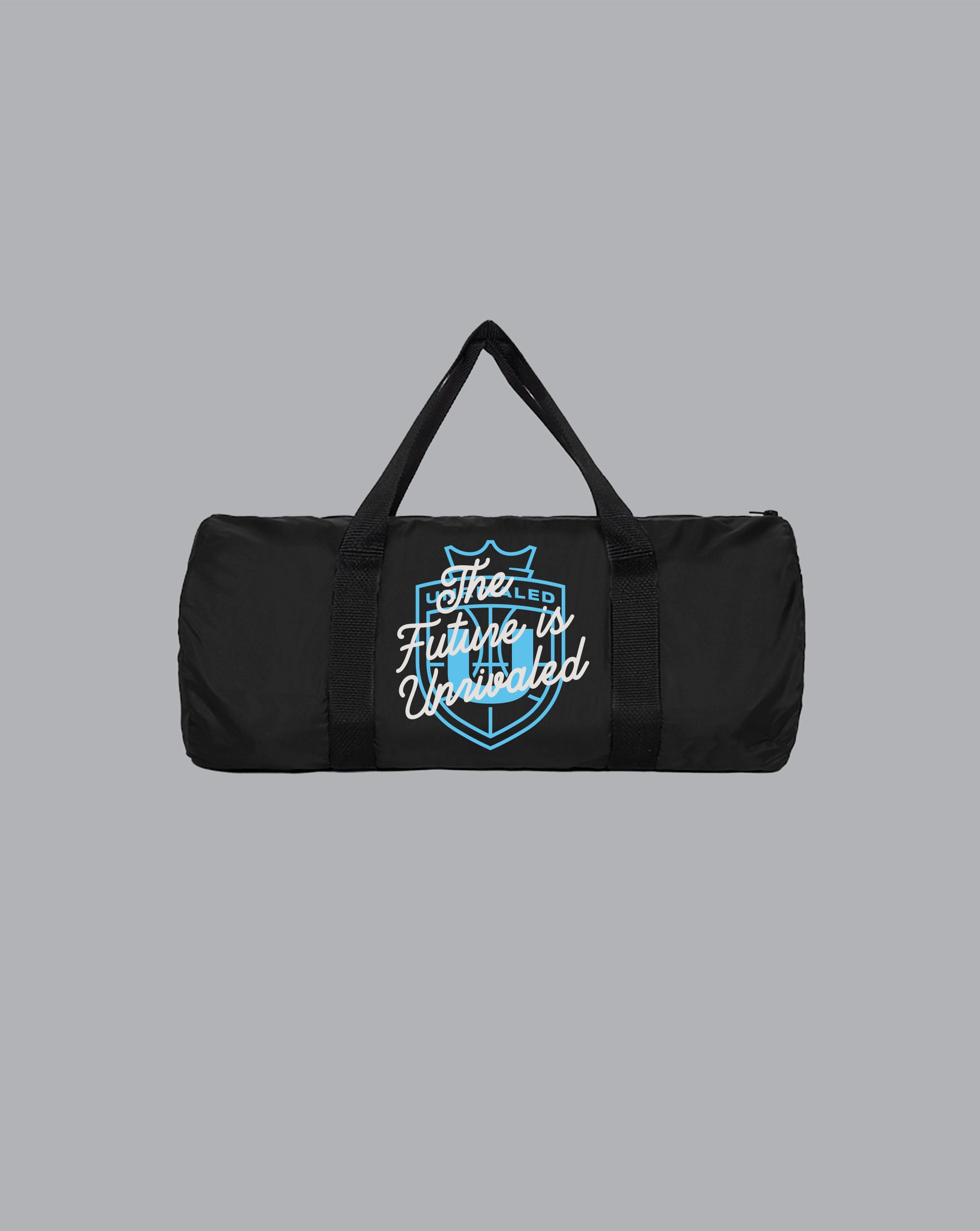 Black duffel bag with white text "The Future is Unrivaled" and blue Unrivaled logo